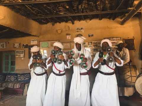 Gnawa musicians performing in Khamlia village near Merzouga