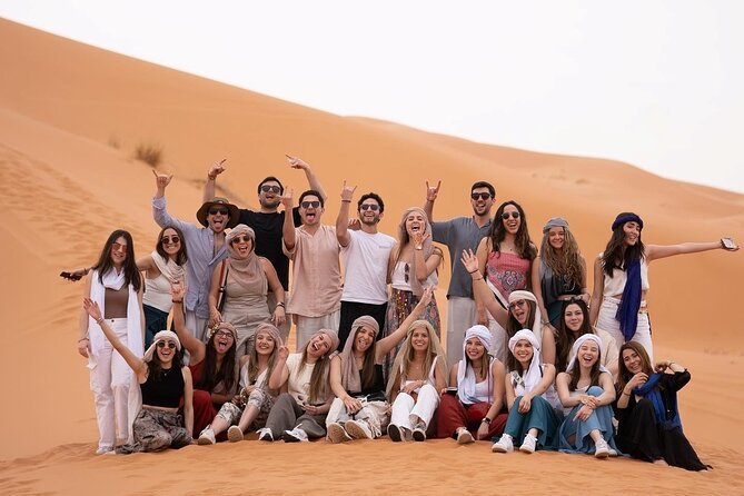 Group on the Erg Chebbi dunes during the Saf Saf oasis jeep tour