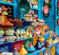 Colourful Moroccan pottery in a souk, a highlight of a first trip to Morocco