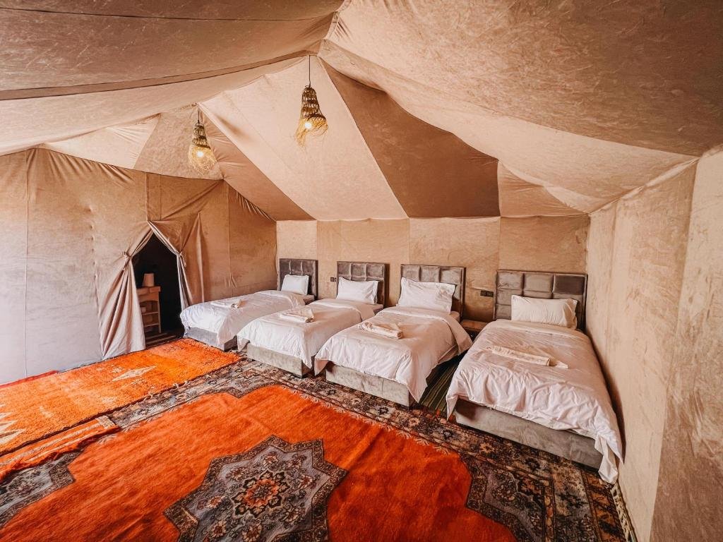 Tents in a bivouac in Merzouga, a night in the dunes